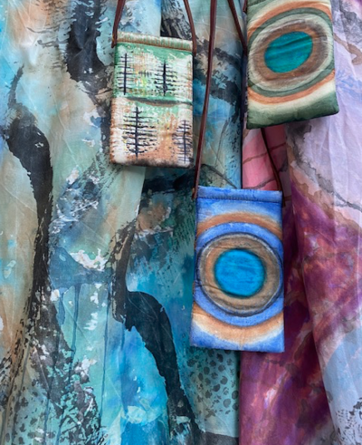 Silk painted scarves and mini phone bags with leather straps