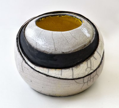Grey shades and yellow carved raku ball